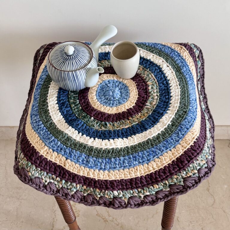 Image of Round Crochet Floor Rug Aubergine, Blue, Moss green, Grey, Lemon, Light purple